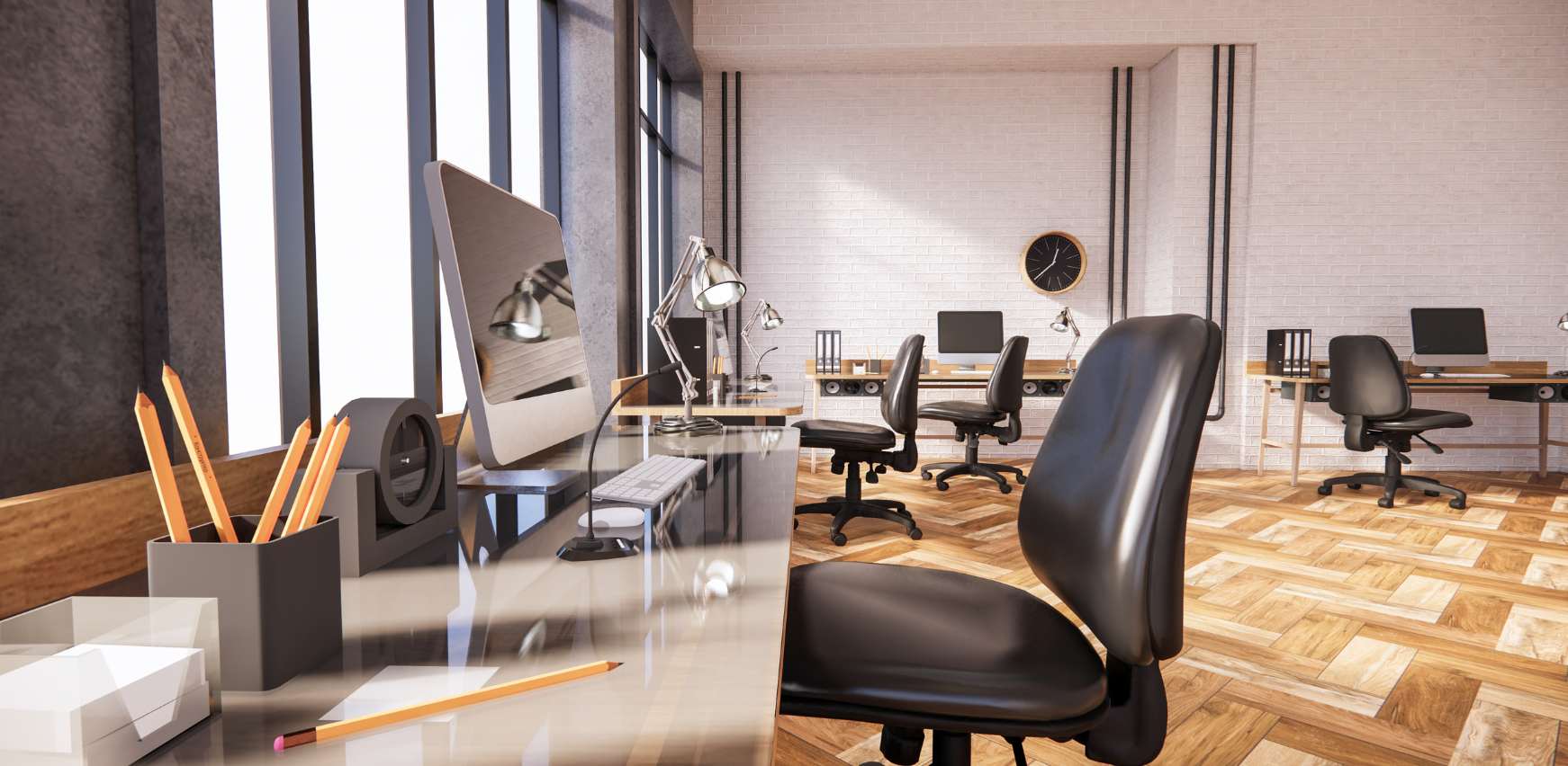Zona de trabajo en oficina con mobiliario operativo ergonómico