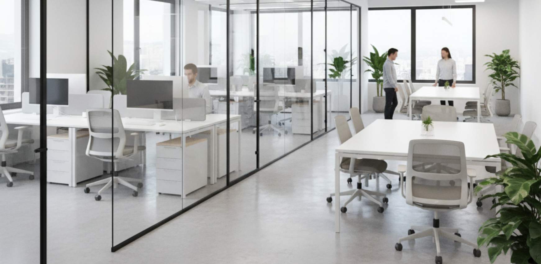 Oficina moderna con compartimentación de vidrio y aluminio en tonos blancos